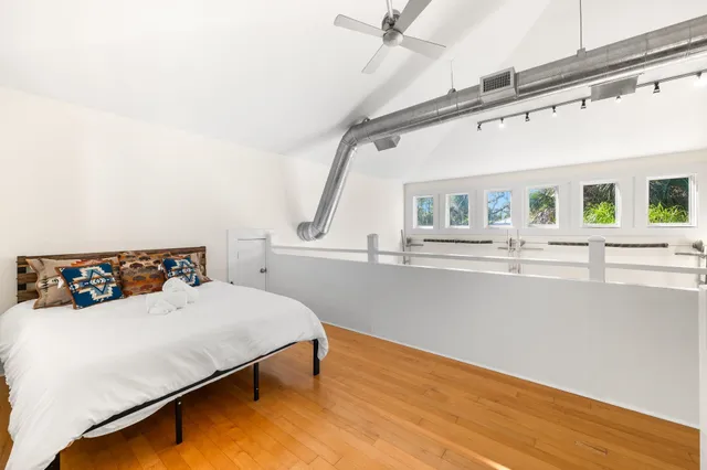 an aerial view of a city with lots of residential buildings