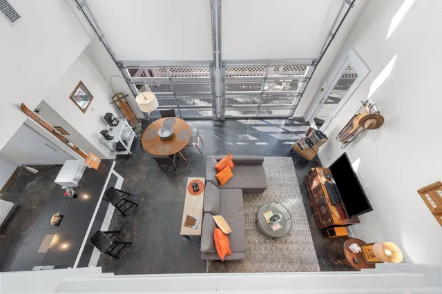 an aerial view of ocean and residential houses