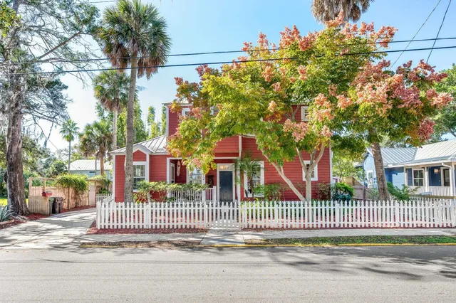 a view of a street with a building in the background