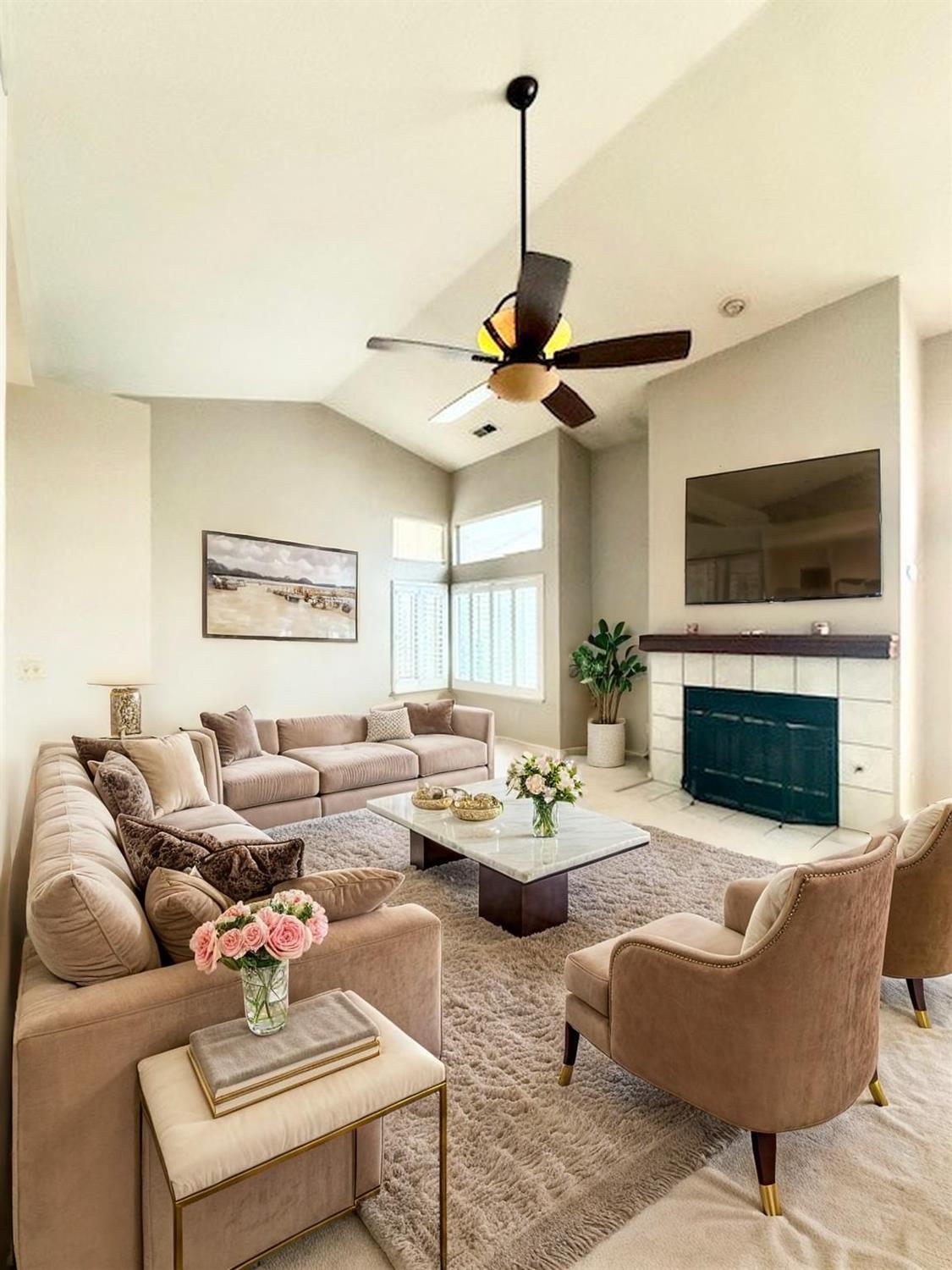 1113 Copper Cottage Lane Modesto, CA 95355 - Photo 1 of 1 a living room with furniture a fireplace and a flat screen tv