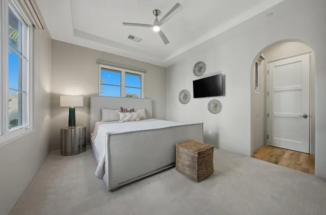 a view of a town with mountains in the background