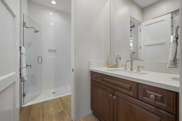 a view of a house with backyard and swimming pool