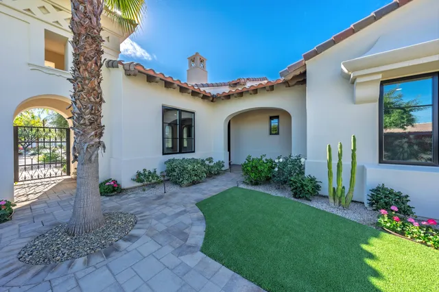 a view of a dining room with furniture and a wooden floor