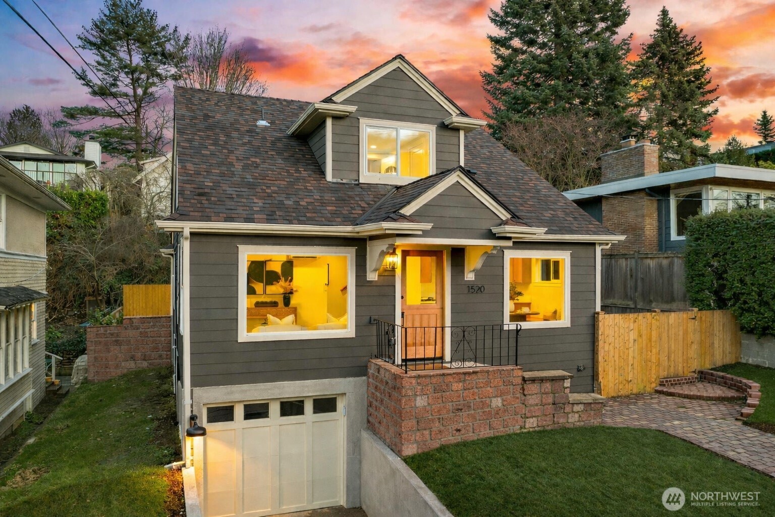 1520 31st Avenue Seattle, WA 98122 - Photo 1 of 27 a front view of a house with yard