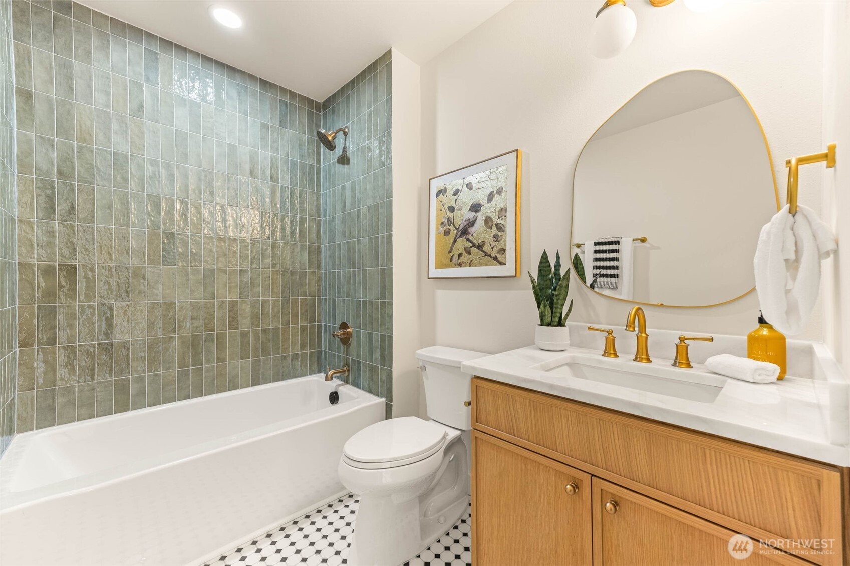 1520 31st Avenue Seattle, WA 98122 - Photo 11 of 27 a bathroom with a sink a toilet and shower