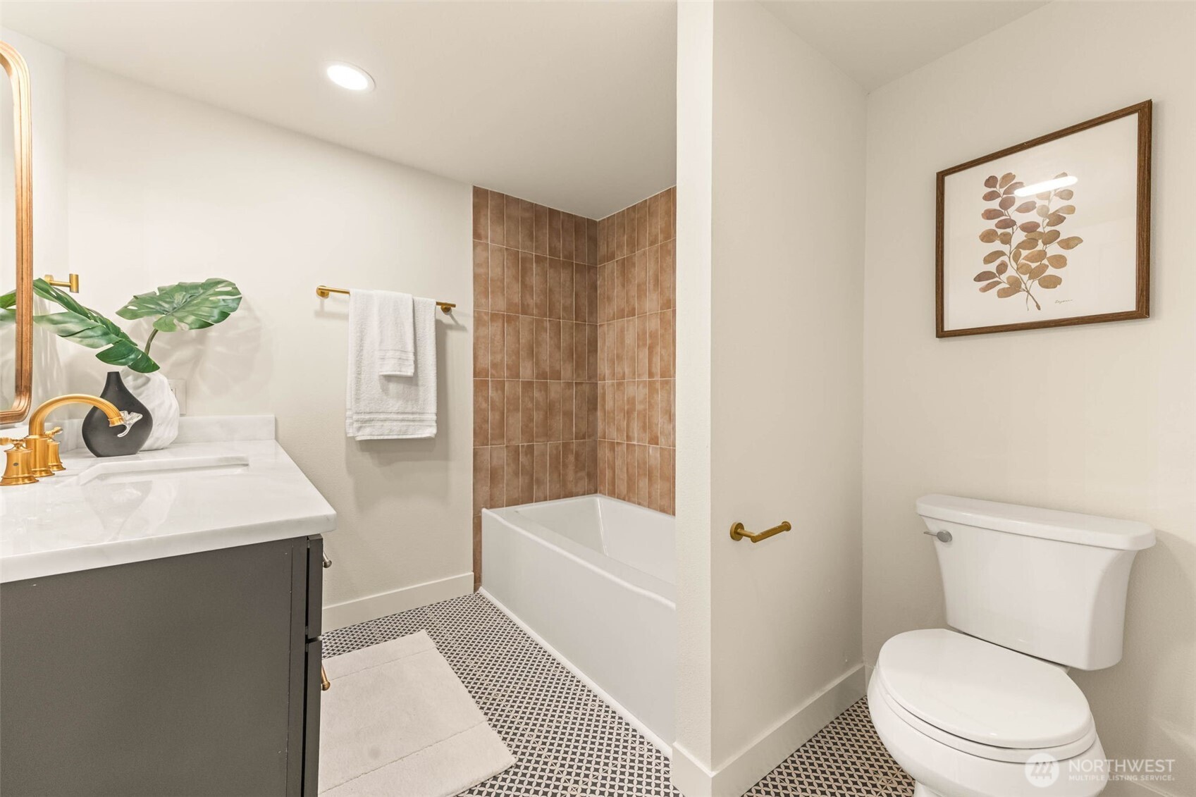 1520 31st Avenue Seattle, WA 98122 - Photo 12 of 27 a bathroom with a toilet a sink and bathtub