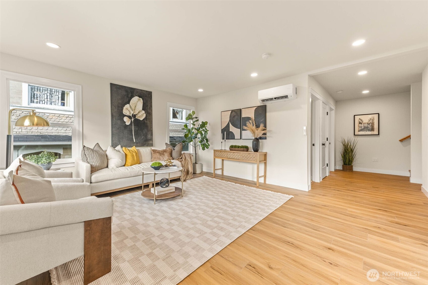 1520 31st Avenue Seattle, WA 98122 - Photo 4 of 27 a living room with furniture and a wooden floor