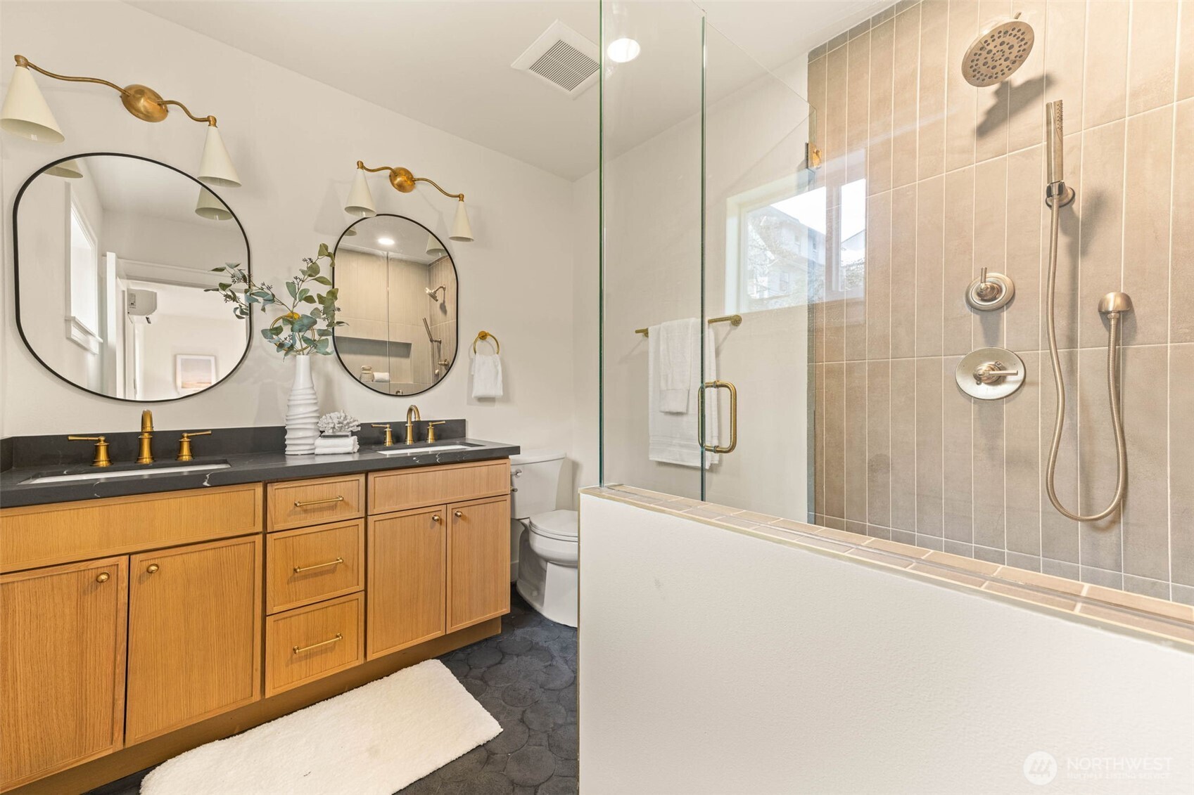1520 31st Avenue Seattle, WA 98122 - Photo 7 of 27 a bathroom with a double vanity sink mirror and shower