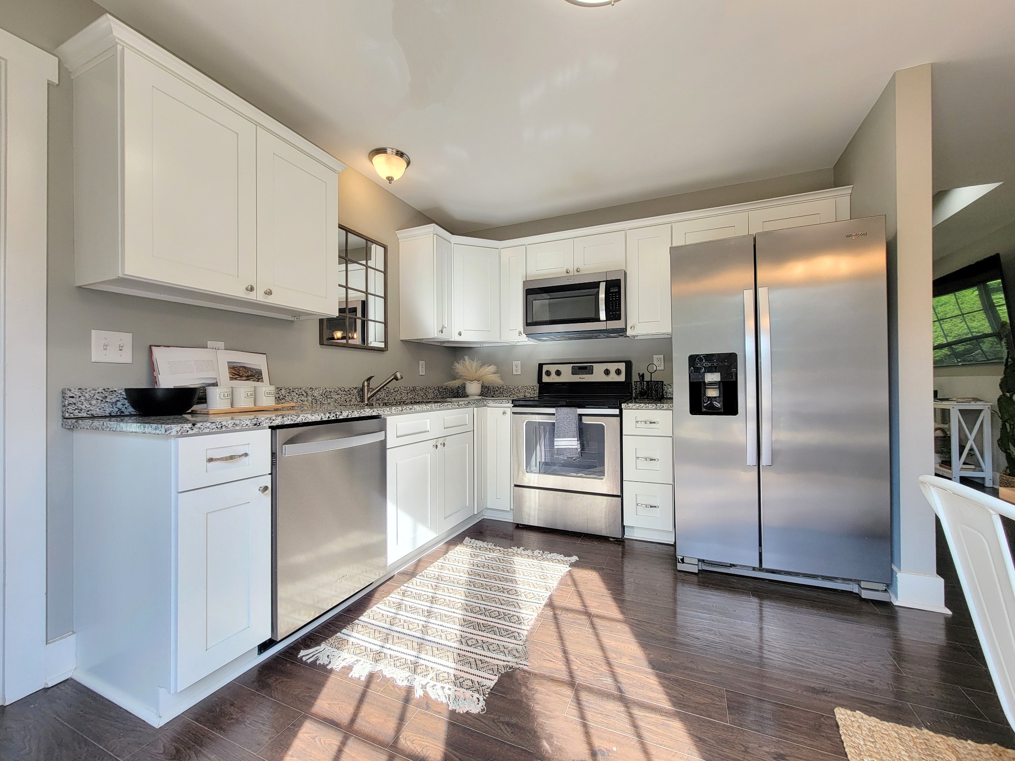 961 Big Springs Road Charlotte, TN 37036 - Photo 16 of 50 Stainless steel appliances make this kitchen shiny and bright!