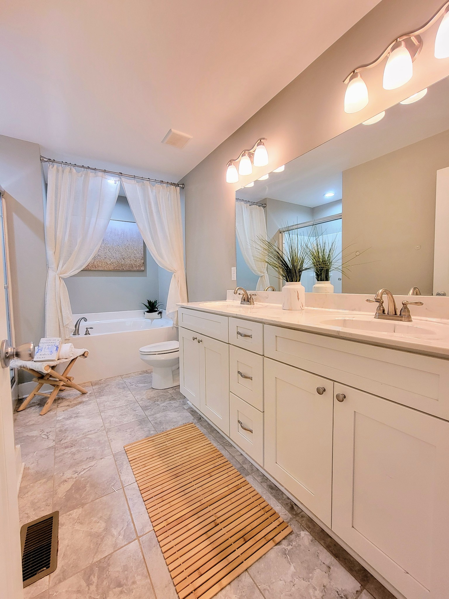 961 Big Springs Road Charlotte, TN 37036 - Photo 28 of 50 Double sinks allow for two people to get ready at the same time easily.