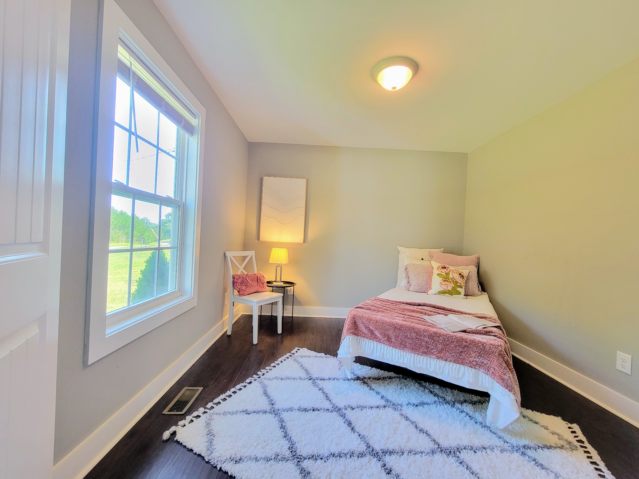 961 Big Springs Road Charlotte, TN 37036 - Photo 33 of 50 Beautiful floors and plenty of light in bedroom #2.