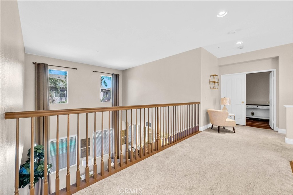 11499 Bridgeway Drive Riverside, CA 92505 - Photo 50 of 70 a view of an empty room with stairs and a window