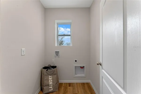 a view of a room with rack on the wall