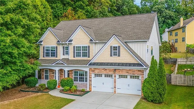 a aerial view of a house yard and balcony