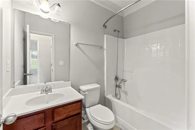 a view of a hallway with wooden floor and an dining room