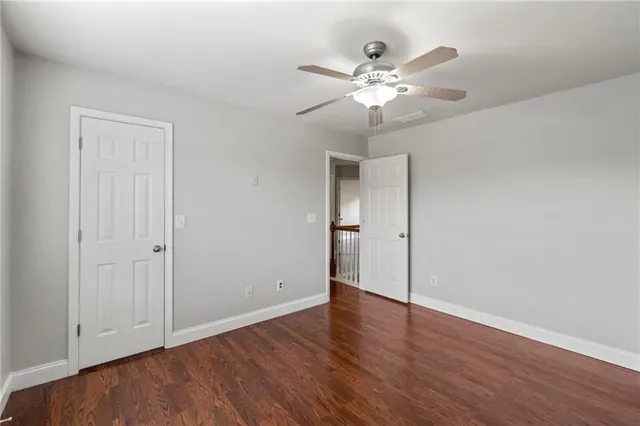 an aerial view of a residential apartment building with a yard