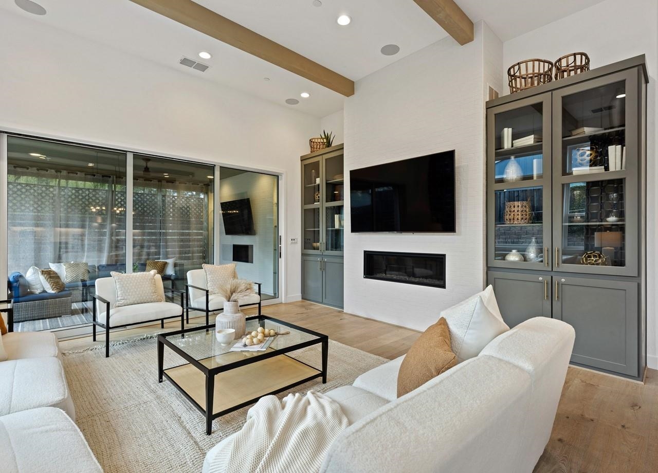 580 Boyd Road Pleasant Hill, CA 94523 - Photo 18 of 60 a living room with furniture a flat screen tv and a fireplace