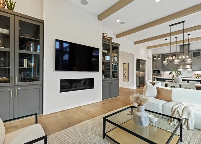 a kitchen with stainless steel appliances granite countertop a sink and cabinets