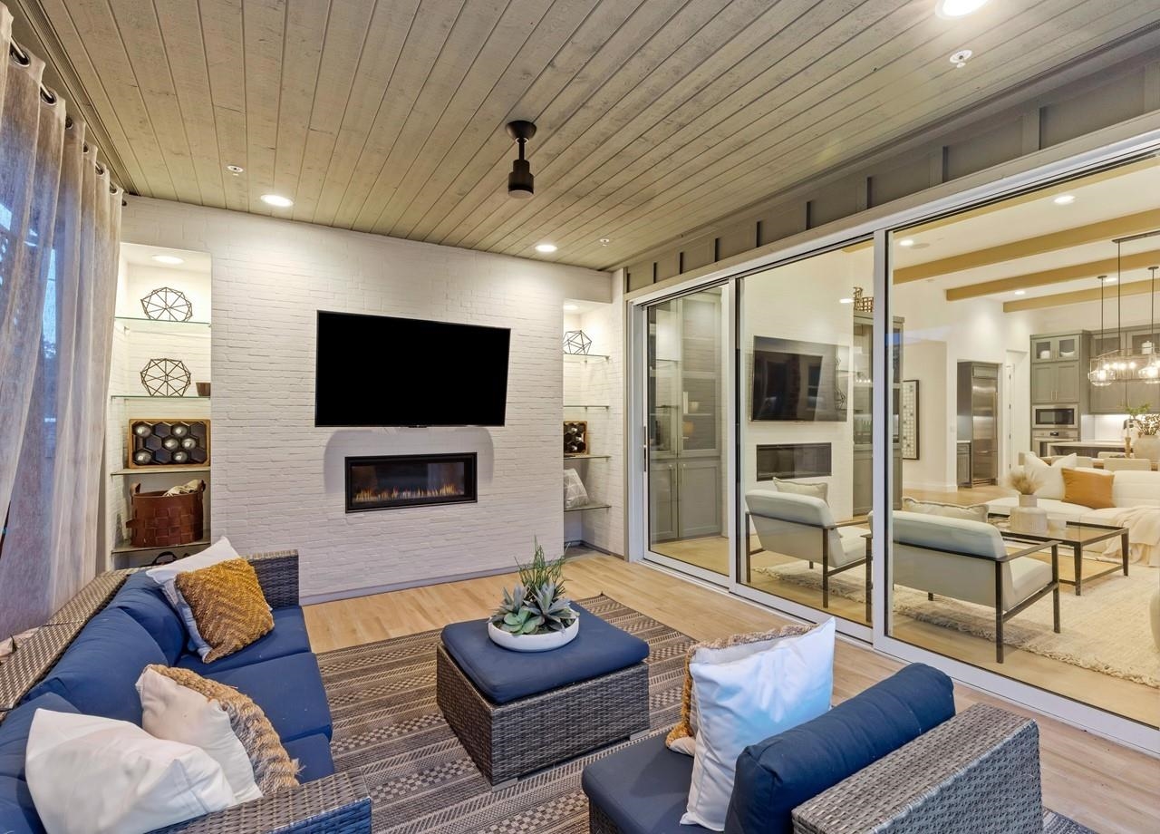 580 Boyd Road Pleasant Hill, CA 94523 - Photo 22 of 60 a living room with furniture and a flat screen tv