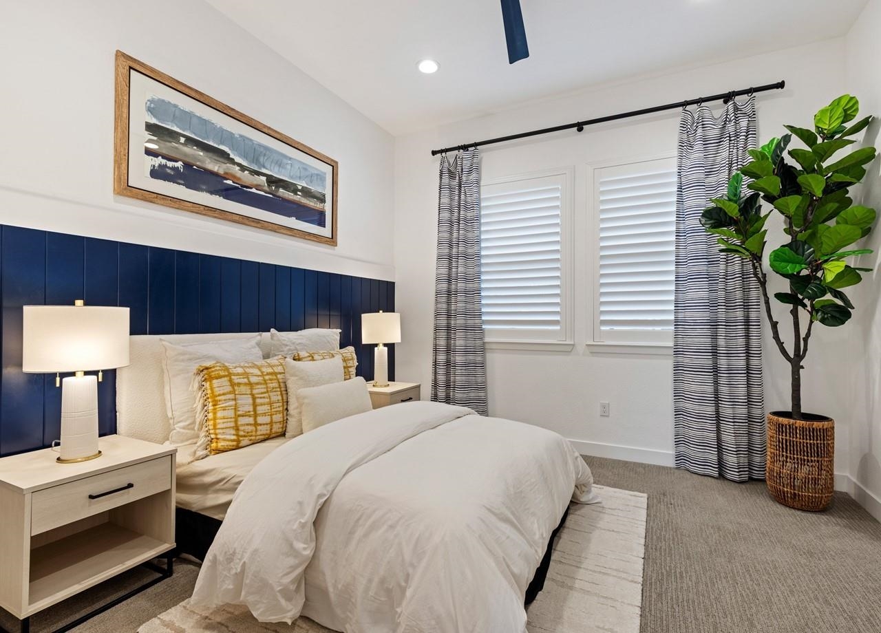 580 Boyd Road Pleasant Hill, CA 94523 - Photo 35 of 60 a bedroom with a large bed and a potted plant