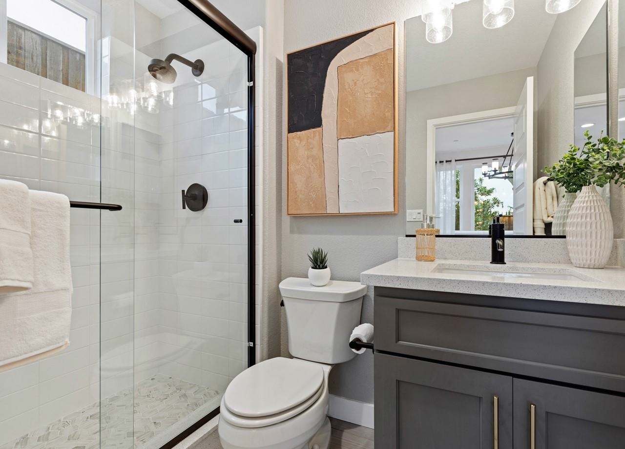 580 Boyd Road Pleasant Hill, CA 94523 - Photo 50 of 60 a bathroom with a sink a toilet a mirror and shower