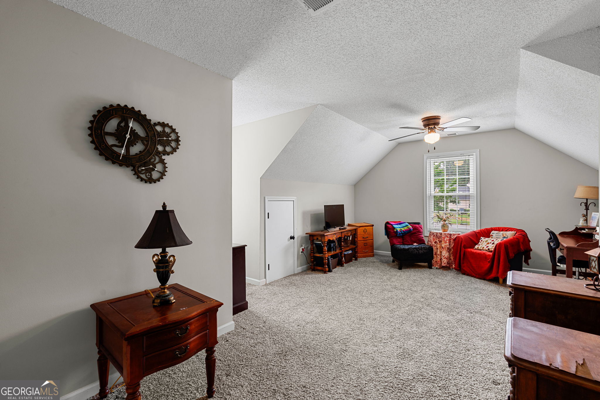 375 Gaelic Way Tyrone, GA 30290 - Photo 35 of 54 a view of a room with a window and gym equipment