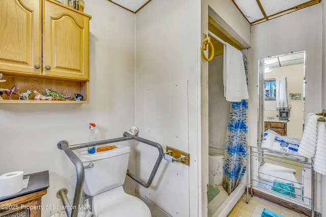 a kitchen with a stove a sink and a refrigerator