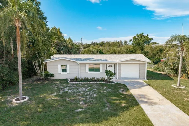 a house view with a garden space