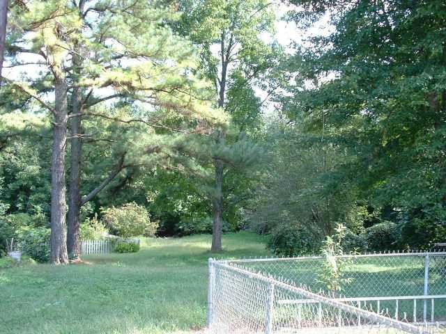 1404 Beverly Drive Raleigh, NC 27610 - Photo 10 of 10 There is more to this yard than the fenced-in area. Yard