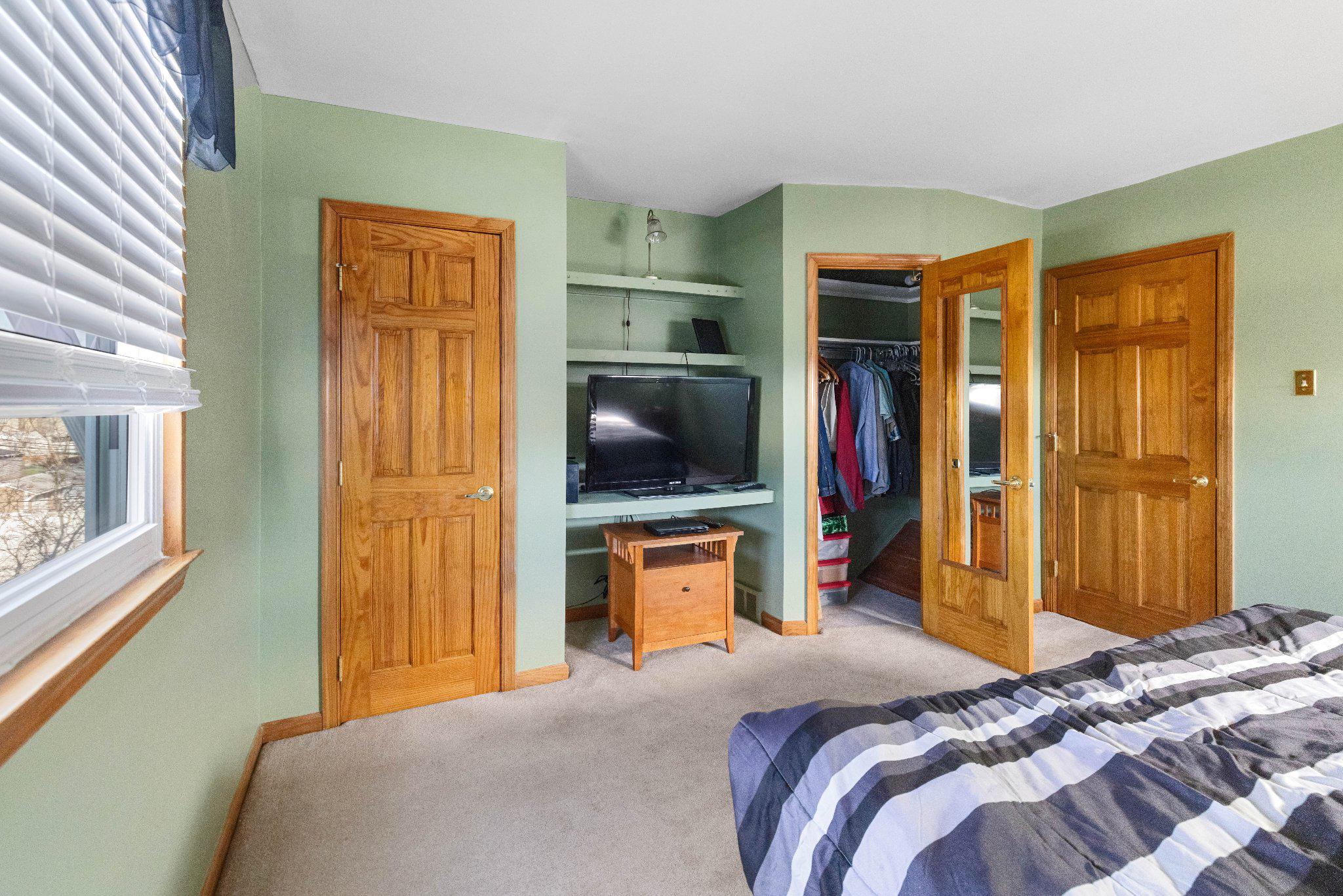 1842 Tomlinson Road Philadelphia, PA 19116 - Photo 12 of 31 a bedroom with a bed and a television