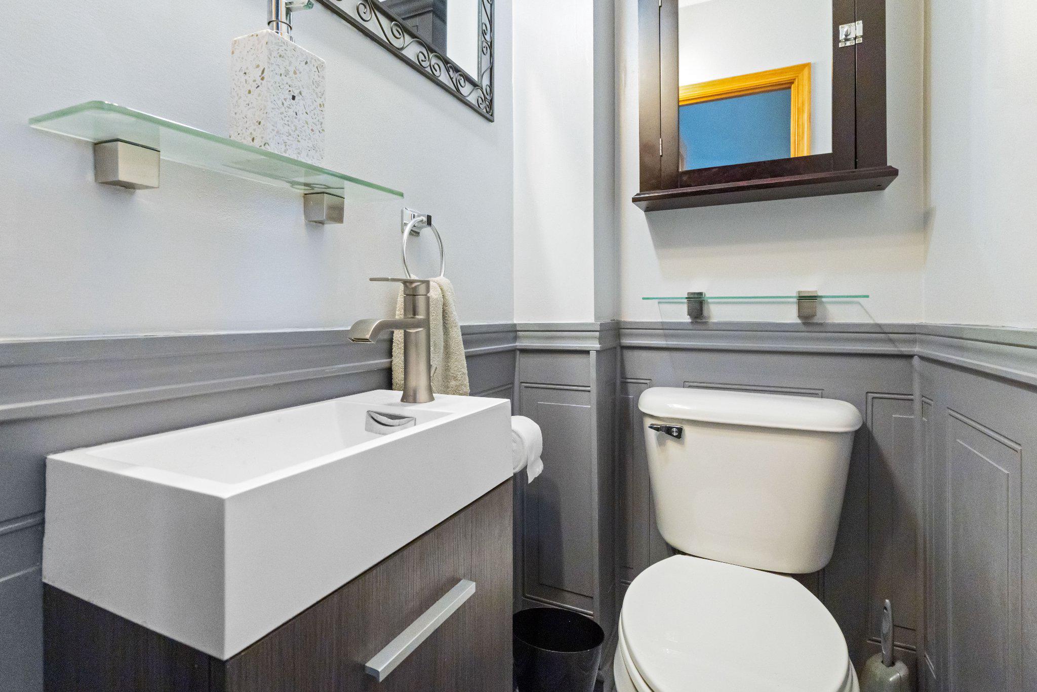 1842 Tomlinson Road Philadelphia, PA 19116 - Photo 14 of 31 a bathroom with a toilet a sink and a mirror