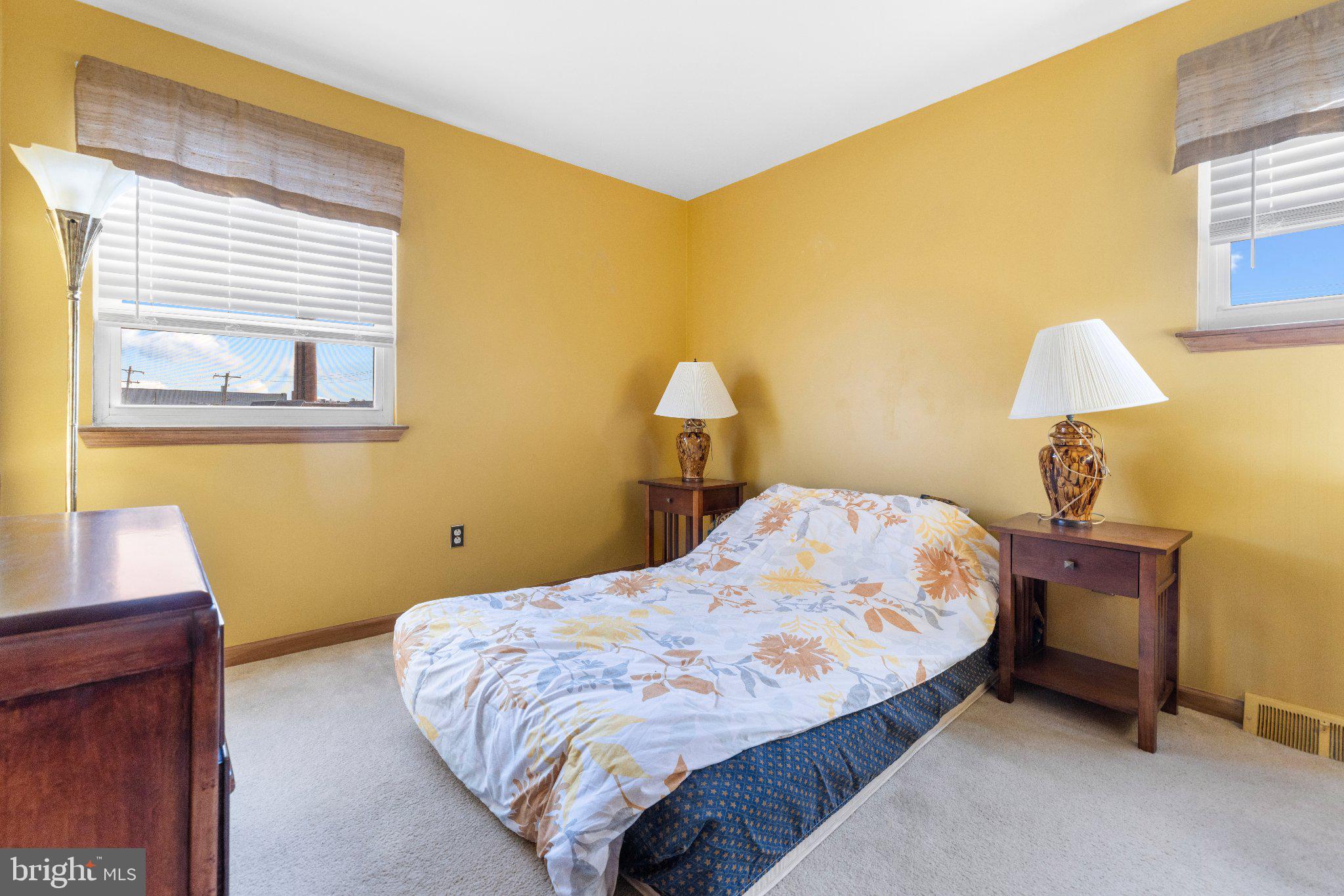 1842 Tomlinson Road Philadelphia, PA 19116 - Photo 16 of 31 a bedroom with a bed and a lamp