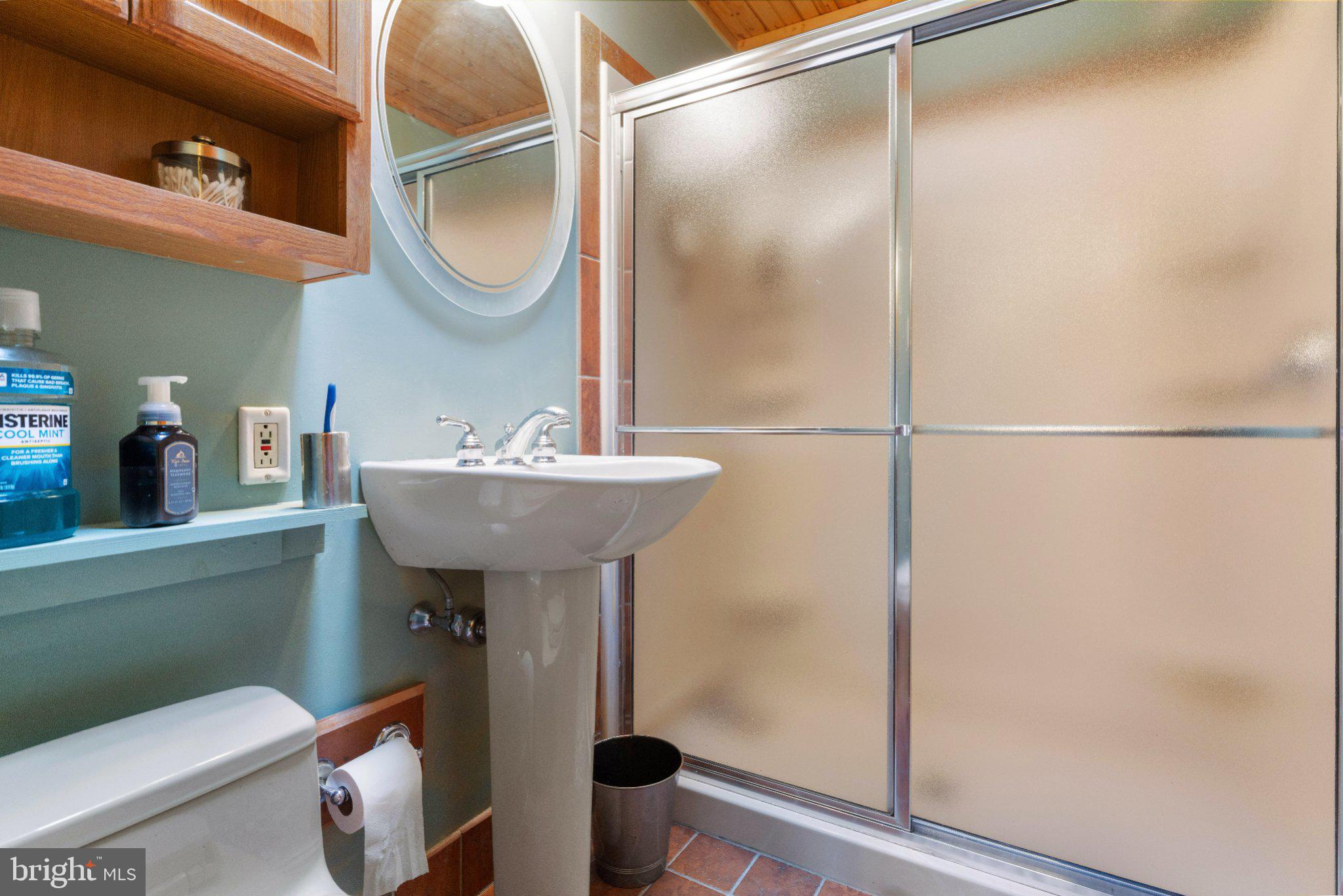 1842 Tomlinson Road Philadelphia, PA 19116 - Photo 18 of 31 a bathroom with a sink toilet and a mirror