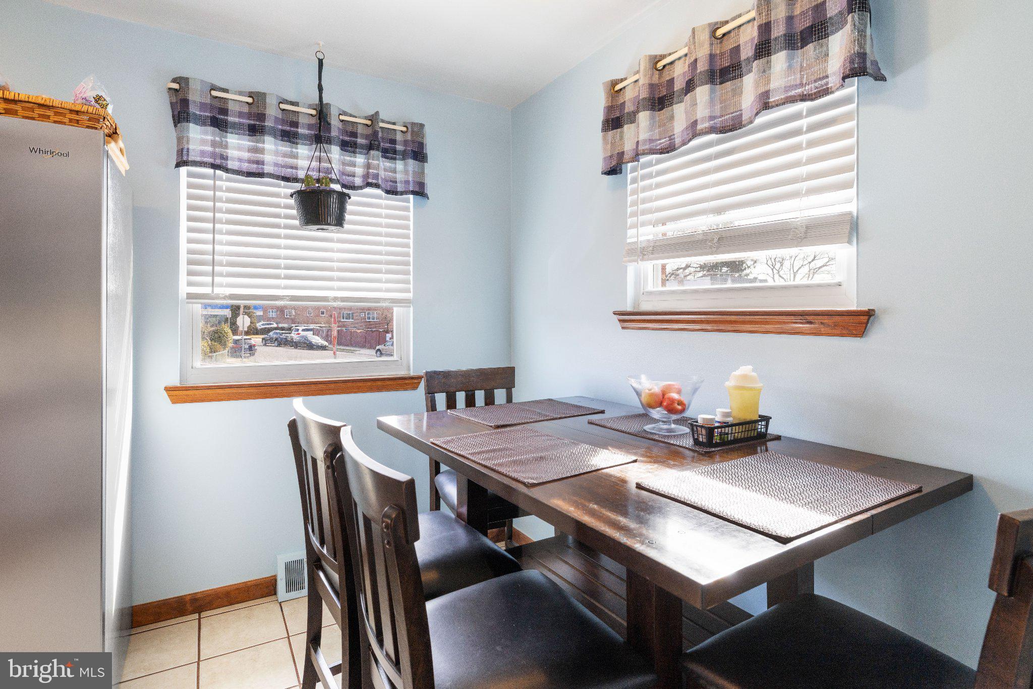 1842 Tomlinson Road Philadelphia, PA 19116 - Photo 9 of 31 a view of a dining room with furniture and window