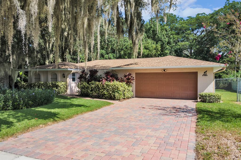 619 Little Wekiva Road Altamonte Springs, FL 32714 - Photo 1 of 1 a house with a yard