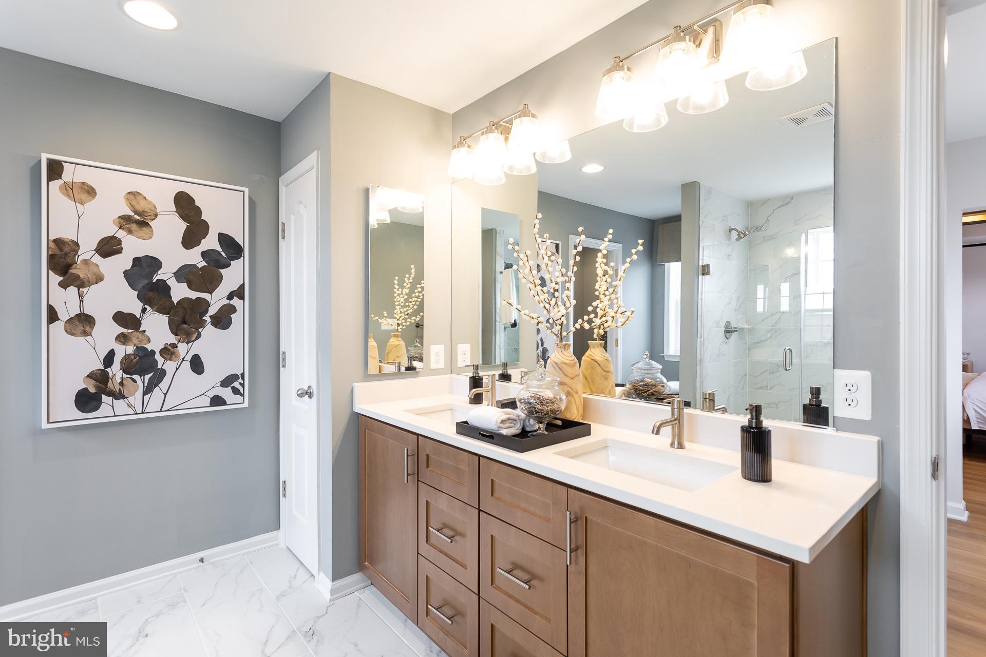 514 Benjamin Drive Hanover, PA 17331 - Photo 12 of 29 a bathroom with a sink double vanity and a mirror