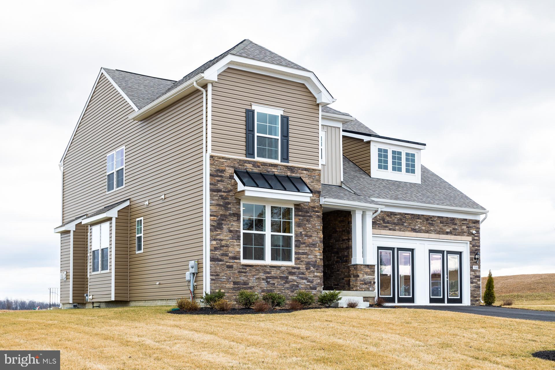 514 Benjamin Drive Hanover, PA 17331 - Photo 2 of 29 a front view of a house with a yard