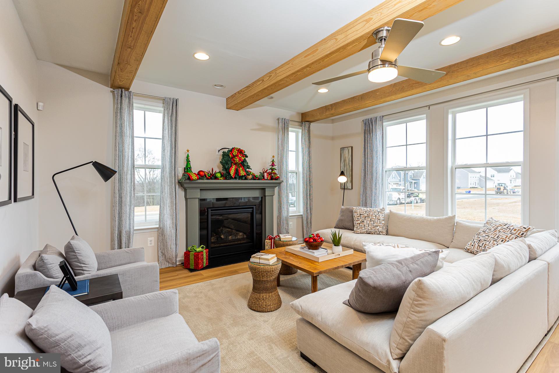 514 Benjamin Drive Hanover, PA 17331 - Photo 9 of 29 a living room with furniture and a fireplace