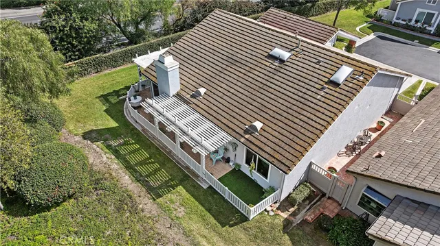 a view of a yard with plants and a outdoor view