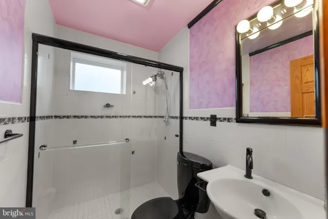 a picture of a bench in front of a building