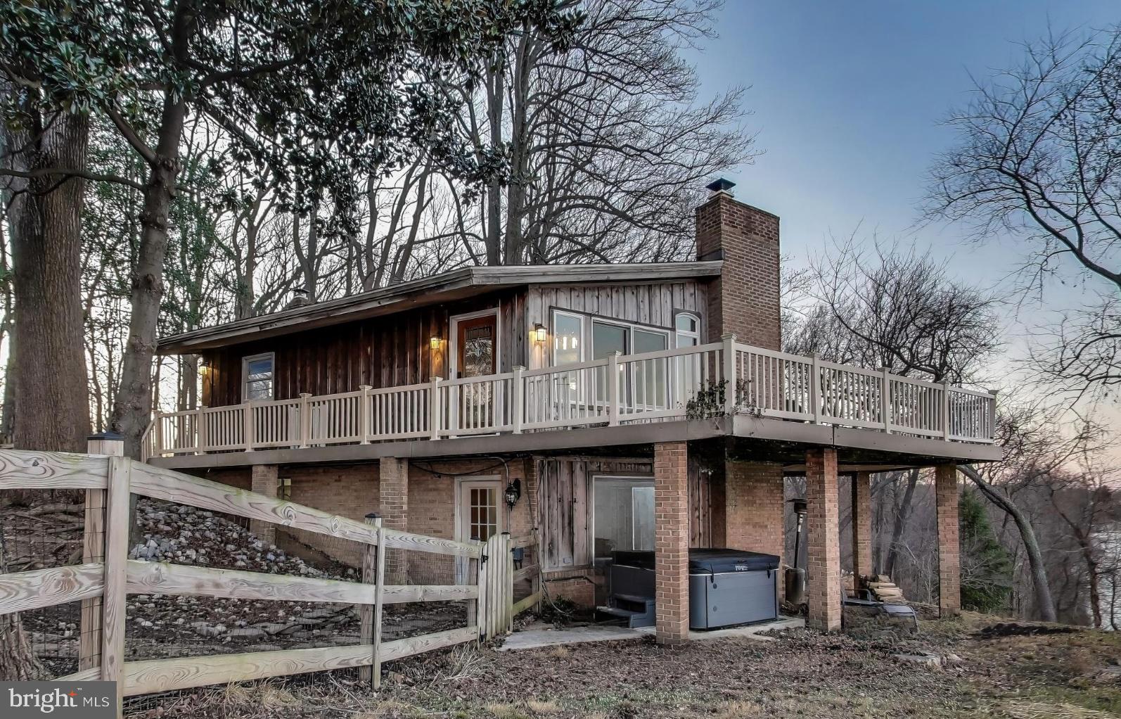 418 Point Mary Circle Tracys Landing, MD 20779 - Photo 4 of 59 a front view of a house with a trees