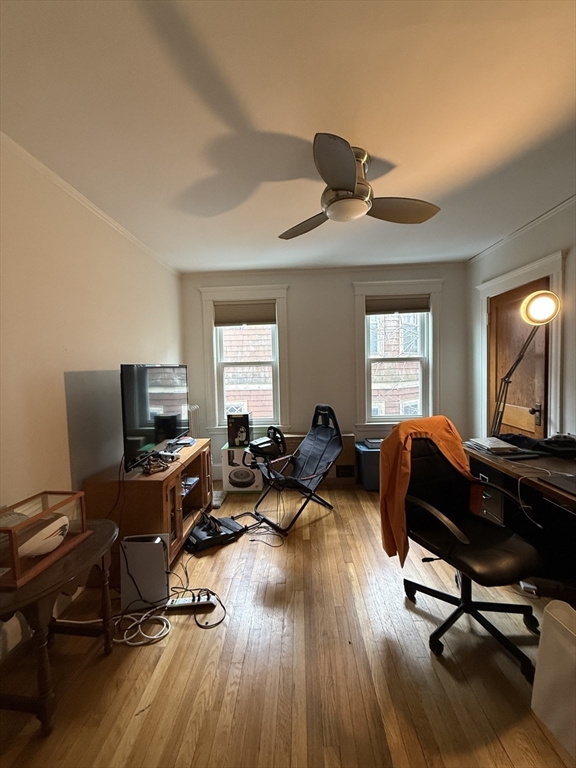 7 View S Avenue, Unit 3 Boston, MA 02130 - Photo 11 of 14 a view of a workspace with furniture and a window
