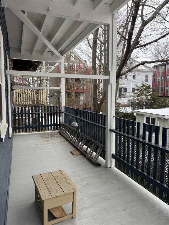 7 View S Avenue, Unit 3 Boston, MA 02130 - Photo 13 of 14 a view of a porch with wooden floor