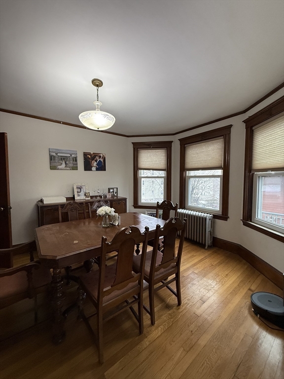7 View S Avenue, Unit 3 Boston, MA 02130 - Photo 5 of 14 a view of a dining room with furniture window and wooden floor