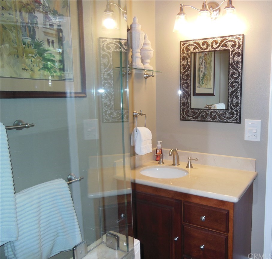 4731 Whipple Road Riverside, CA 92506 - Photo 20 of 66 PRIMARY BATHROOM. VANITY w/MARBLE COUNTERS, Newer Lighting.
