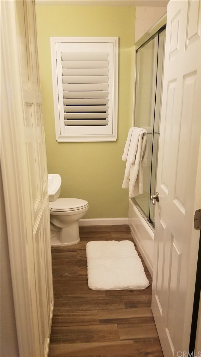 4731 Whipple Road Riverside, CA 92506 - Photo 26 of 66 FULL BATHROOM between Bedrooms #2 & #3. NOTE: Ceramic, "Wood-look" Tile)