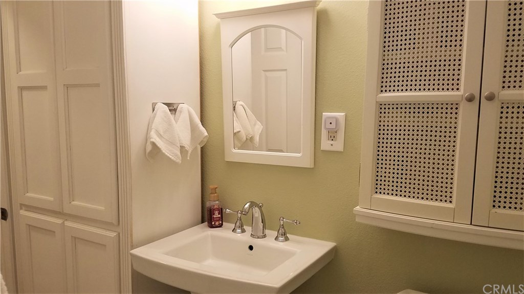 4731 Whipple Road Riverside, CA 92506 - Photo 27 of 66 FULL BATHROOM. NOTE: Custom, upright. Floor Closet Cabinet, and, Wall Cabinet