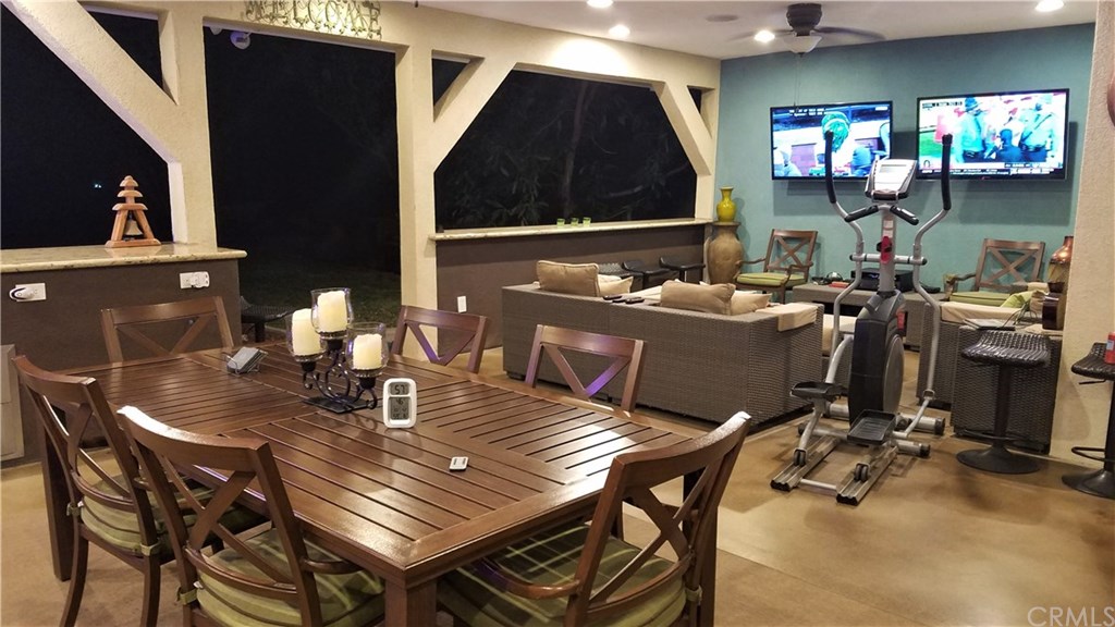 4731 Whipple Road Riverside, CA 92506 - Photo 33 of 66 BOOM! WELCOME TO THE LOGGIA! (O.L.A.!) You'll find this Area to be Highly-useful, yet made for FUN TIMES, Day or Night! When the NEW ROOF was placed on Home, an extension of that Permitted Construction, provided a Ceiling for The Loggia!