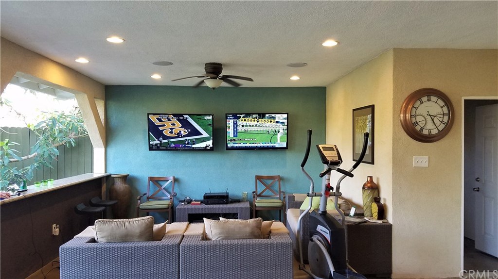 4731 Whipple Road Riverside, CA 92506 - Photo 35 of 66 LAUNDRY ROOM is the Door on the right! AVOCADO is the Tree on the Left! OPEN AIR LIVING is where it's all at! (NOTE STUCCO CEILING w/Recessed Lighting & Outdoor Speakers; One of Two Ceiling Fans!)