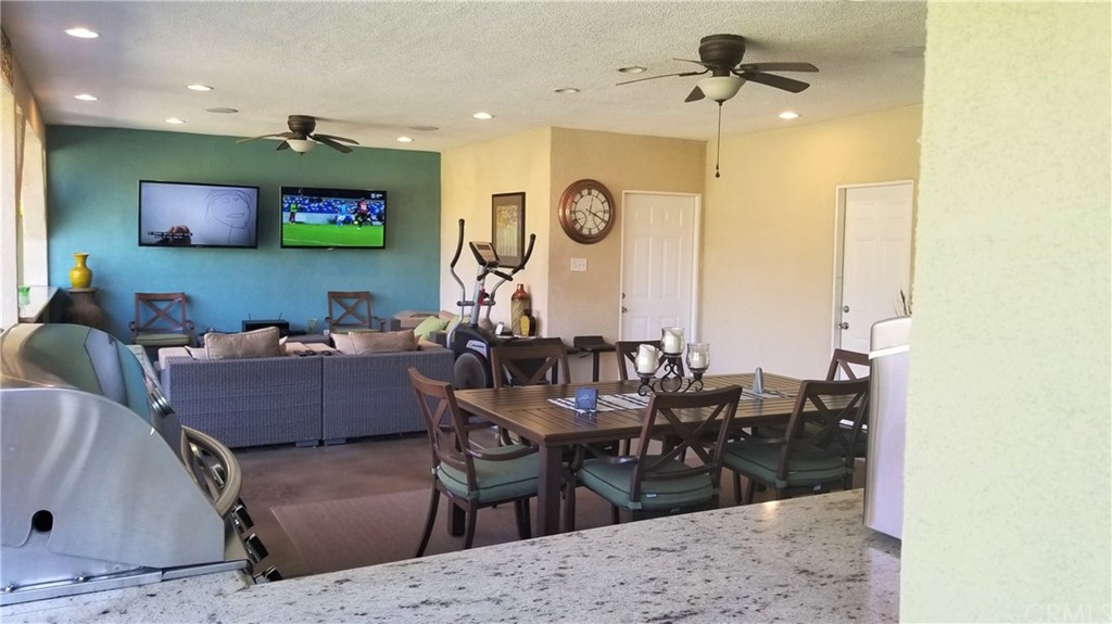 4731 Whipple Road Riverside, CA 92506 - Photo 36 of 66 LOGGIA - VIEW FROM YARD OVER KITCHEN w/GRANITE TO DINING AREA TO LIVING AREA